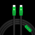 Heavy-duty black silicone USB-C to USB-C charging cable with green tips.